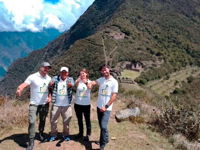 Guided Choquequirao trek cusco travelers exploring Inca ruins